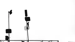 Silhouette of photography or film lighting equipment on white background