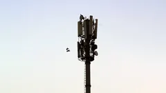 Telecommunication cell tower with antennas against clear sky
